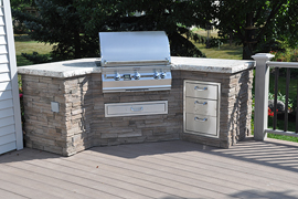 Custom grill fits corner of deck