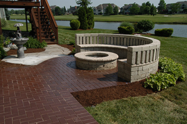 Patio extension with firepit and circular seating