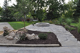 Circular firepit on elevated patio
