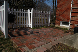 Small patio for just a couple of people and a grill.