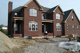 View of new home with no landscaping installed.